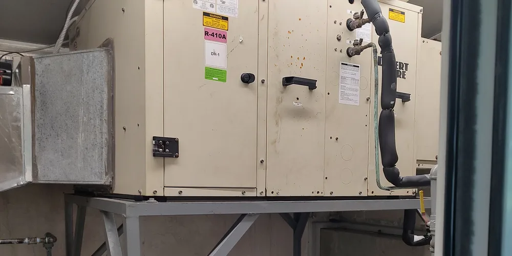 Packaged residential HVAC unit serviced by TAP Heating and Cooling